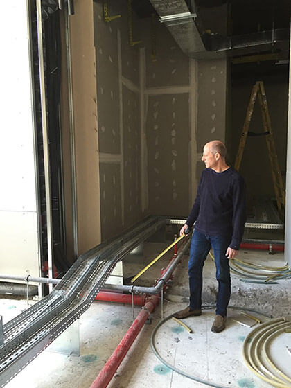 Nir Levy inspects the construction of the new Microsoft Garage facility in Herzliya, Israel