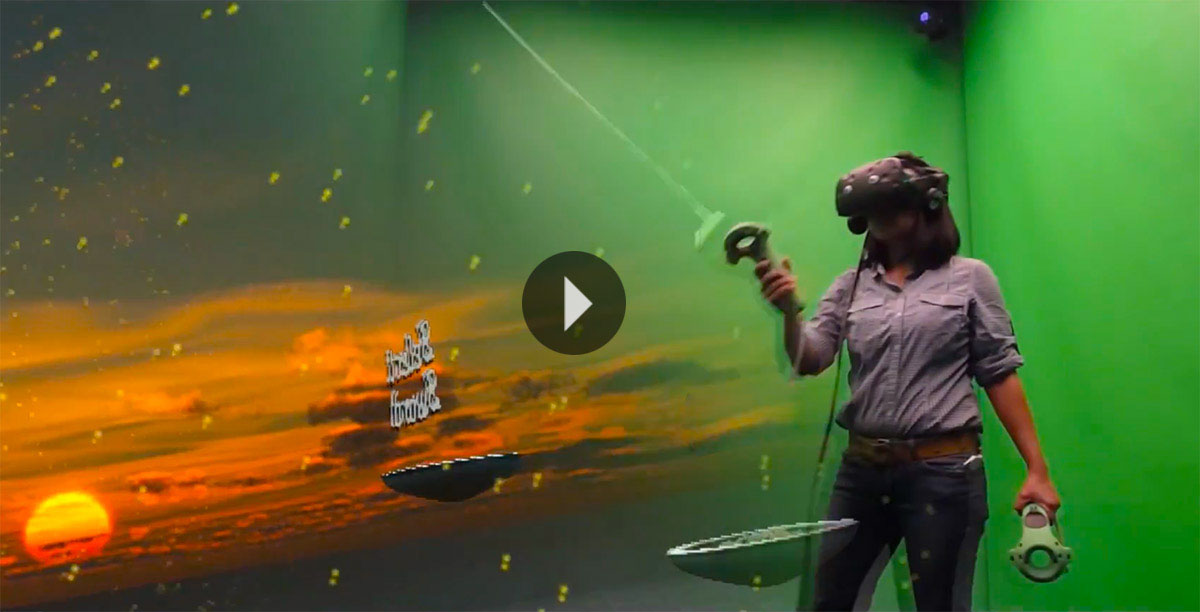 playing a virtual reality game within a green screen video compositing area