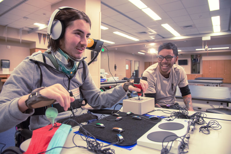 a man using the Xbox Adaptive Controller 