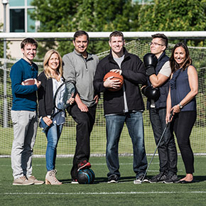 The Sports Performance Platform team is pictured on a Microsoft Campus field