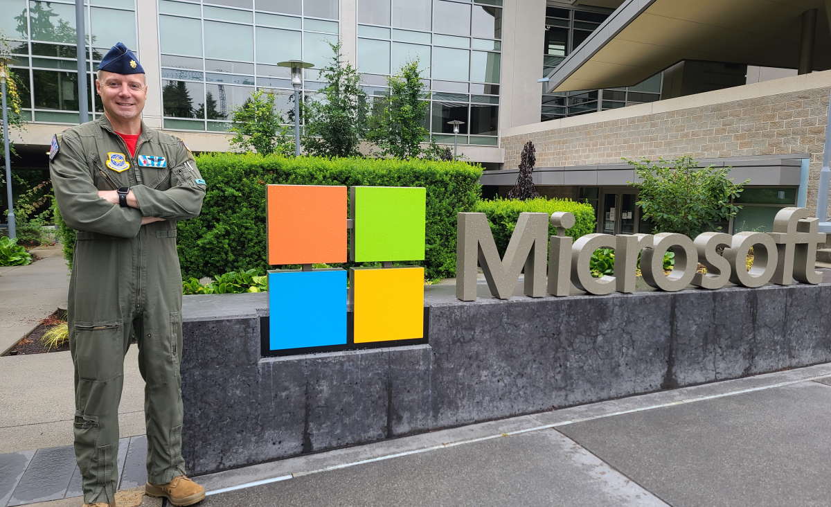 Major Ryan Middleton standing in front of Microsoft sign